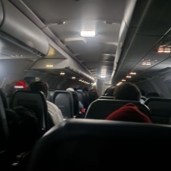 Frontier Airlines - Nighttime on the plane. - Airlines Near Me - Atlanta, Georgia Frontier Airlines - Nighttime on the plane. - Airlines Near Me - Atlanta, Georgia
