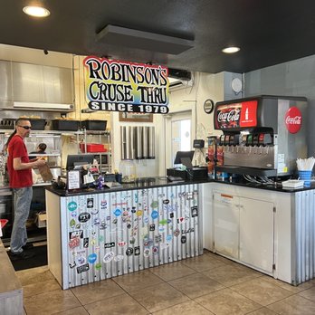 Robinson's Cruse Thru - a man in a kitchen - Mexican Near Me - Fort Walton Beach, Florida Robinson's Cruse Thru - a man in a kitchen - Mexican Near Me - Fort Walton Beach, Florida