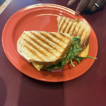 Red Elm Cafe - Breakfast sandwich with cheese, eggs, spinach, and meat of choice - Cafes Near Me - Tacoma, Washington
