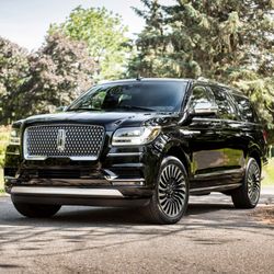 A Crystal Coach Limousines - Lincoln Navigator Executive Luxury SUV.