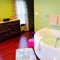 Embrace Midwifery Care & Birth Center - Serenity Suite, with birth stool, birth ball, and water birth tub
