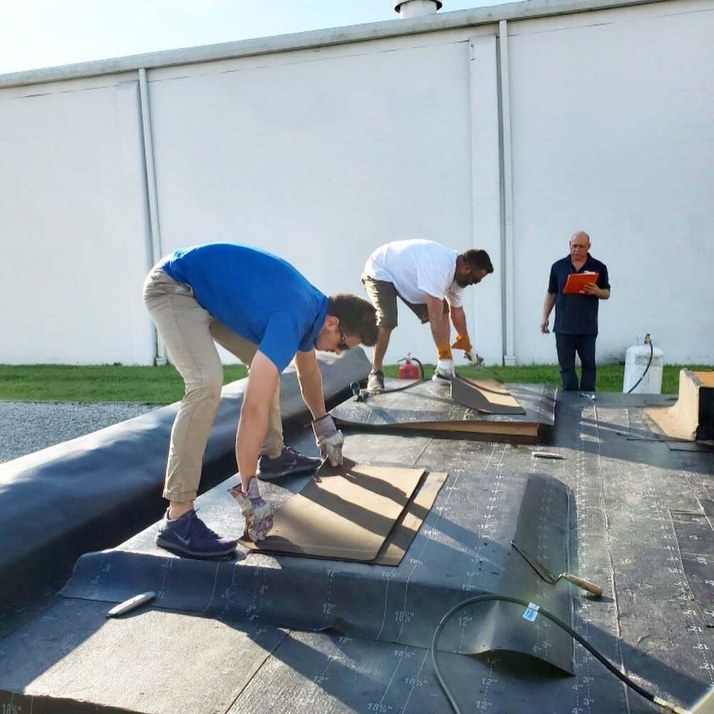 Slide of Perkins Roofing - Miami