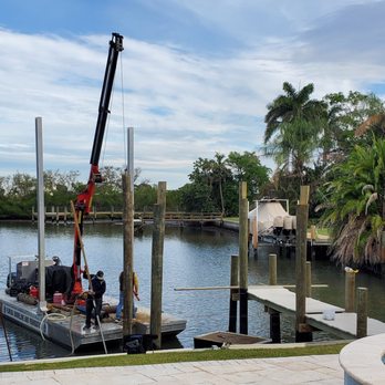 Florida Shoreline and Foundation - a boat docked at a dock - General Contractors Near Me - Sarasota, Florida Florida Shoreline and Foundation - a boat docked at a dock - General Contractors Near Me - Sarasota, Florida