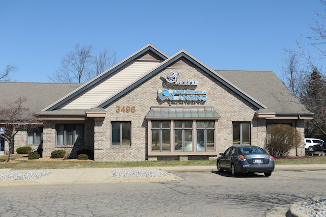 Acne Center of Lansing Logo