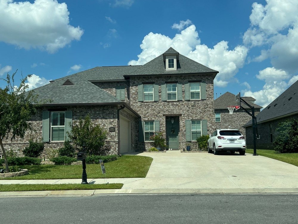 Slide of Gator Roofing and Restoration