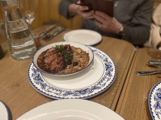 Photo of The Emporium: An American Brasserie - Fort Collins, CO, US. Bean stew with steak