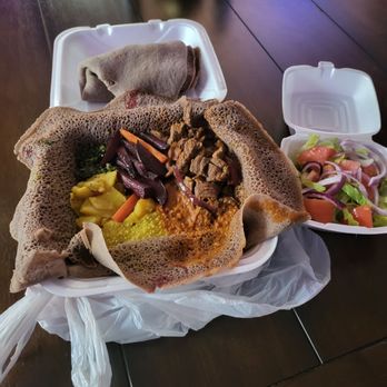 Mini Ethiopia Coffee House - Mahberawi - veggie combo and beef tips with side salad. Lentis. Green. Cabbage. Redroot rice and ribeye tibs. All such a lovely taste!! - Coffee & Tea Near Me - Whitehall, Ohio Mini Ethiopia Coffee House - Mahberawi - veggie combo and beef tips with side salad. Lentis. Green. Cabbage. Redroot rice and ribeye tibs. All such a lovely taste!! - Coffee & Tea Near Me - Whitehall, Ohio