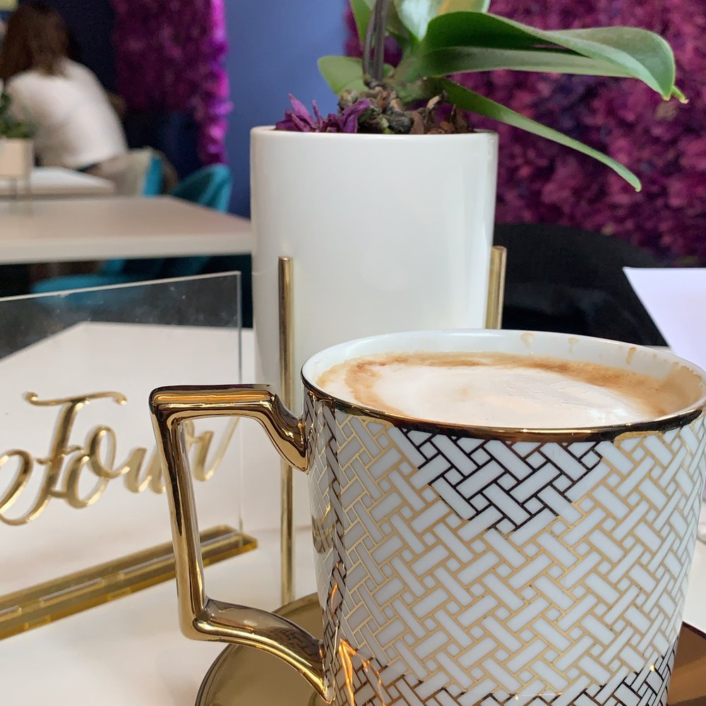 Naked Bakery - Almond Milk Mocha in a golden mug - Bakeries Near Me - Edinburgh, EDH