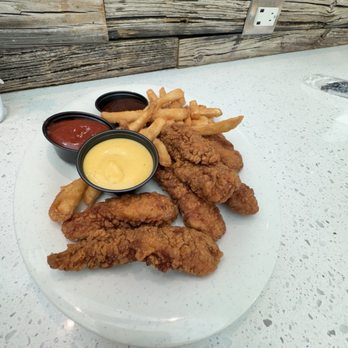 Cask & Larder - Chicken Tenders with an add on of fries. - Southern Near Me - Orlando, Florida Cask & Larder - Chicken Tenders with an add on of fries. - Southern Near Me - Orlando, Florida