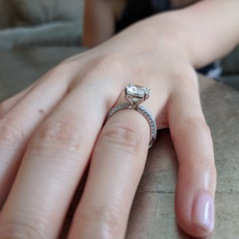 Schiffman's - Platinum engagement ring. Round brilliant cut diamond, four prong setting, 56 diamond round full cut melee pave in a 3 arrangement. - Watches Near Me - Greensboro, North Carolina