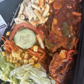 Jamaican Flavors - Stewed Snapper with Rasta Pasta and salad - Bakeries Near Me - Jamaica, New York