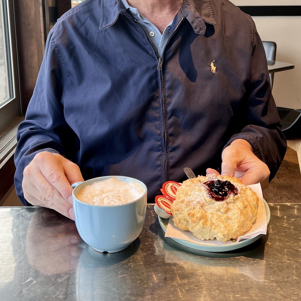 Frankly Coffee - A cappuccino and a blueberry scone. - Coffee & Tea Near Me - Kamloops, British Columbia Frankly Coffee - A cappuccino and a blueberry scone. - Coffee & Tea Near Me - Kamloops, British Columbia