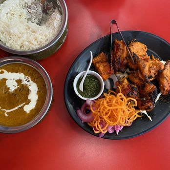 Indian Villa - a plate of food on a red table - Indian Near Me - Edmonton, Alberta