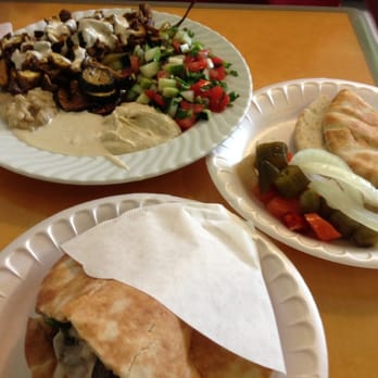 Mana Mana Middle Eastern Restaurant - Falafel pita, Shawarma plate with a side of pickled vegetables - Mediterranean Near Me - Clearwater, Florida Mana Mana Middle Eastern Restaurant - Falafel pita, Shawarma plate with a side of pickled vegetables - Mediterranean Near Me - Clearwater, Florida