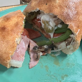 Giovanni's Italian restaurant - Stromboli with all its goodness - Italian Near Me - Hamilton, Texas Giovanni's Italian restaurant - Stromboli with all its goodness - Italian Near Me - Hamilton, Texas