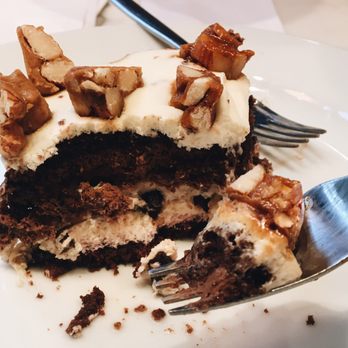 Ninina - "Queen" cake. Fluffy chocolate cake, chocolate moose, black cherries & a walnut brittle on top. Need I say more? - Cafeteria Near Me - Buenos Aires, C Ninina - "Queen" cake. Fluffy chocolate cake, chocolate moose, black cherries & a walnut brittle on top. Need I say more? - Cafeteria Near Me - Buenos Aires, C