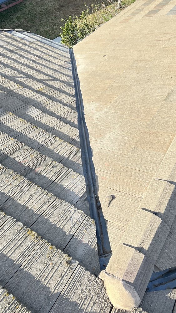 Slide of Lambert Roofing