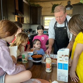 Elite Personal Chefs - Chef Austin nailing the 'cooking experience' with the kids! - Caterers Near Me