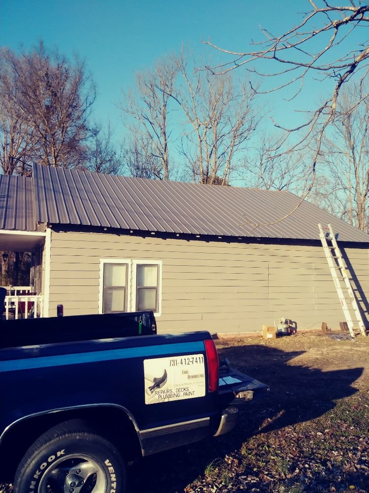 Slide of Tim's Roofing & Remodeling