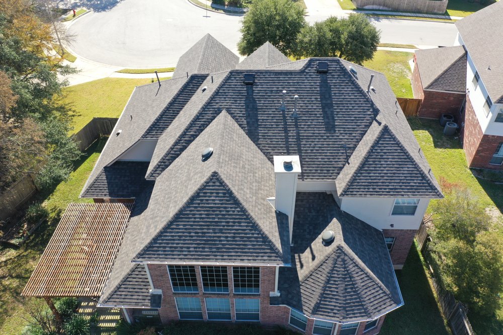 Slide of Otis Roofing