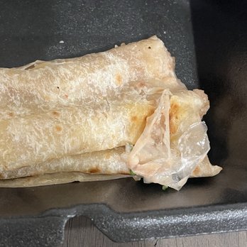 Taqueria Factory - Burrito with cheese and plastic. - Mexican Near Me - Chandler, Arizona Taqueria Factory - Burrito with cheese and plastic. - Mexican Near Me - Chandler, Arizona