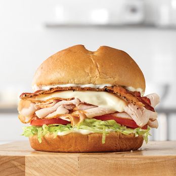 Arbys - GRAND TURKEY CLUB (From their website).  In reality it looks much smaller.  Still tasted good! - Fast Food Near Me - Reseda, California