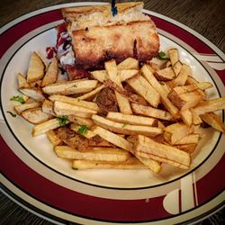 The Italian Peasant - Half meatball parmigiana sandwich and fries.