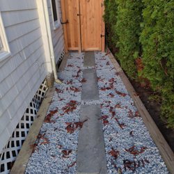 J Post Property Maintenance - Dug out, framed out the area with 6x6 and filled in. Walkway up to outdoor shower.