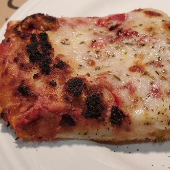 The Wurlitzer Pizza - Thick crust with burnt clumps of garlic powder - Pizza Near Me - North Tonawanda, New York The Wurlitzer Pizza - Thick crust with burnt clumps of garlic powder - Pizza Near Me - North Tonawanda, New York