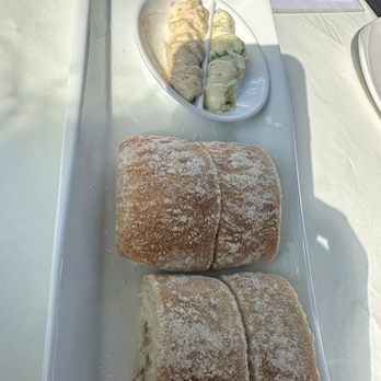 Table 5 - Bread service with delicious butters - New American Near Me - Northville, Michigan