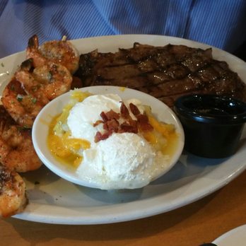 Texas Roadhouse - Steak and Shrimp with the loaded potato. - American Near Me - Taguig City, NCR