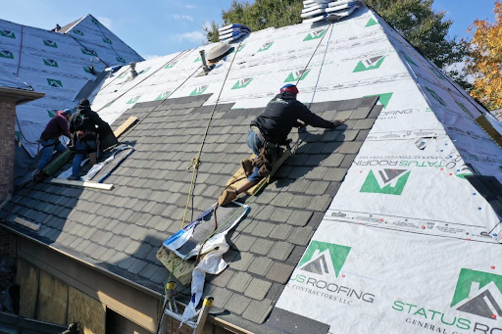 Slide of Status Roofing