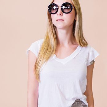 EYEBAR Houston - Miu Miu sunglasses - Eyewear & Opticians Near Me - Houston, Texas EYEBAR Houston - Miu Miu sunglasses - Eyewear & Opticians Near Me - Houston, Texas