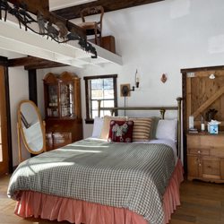 Cedar Ridge Ranch - The main room in our Cowgirl cabin with a Queen bed