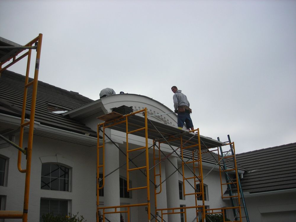 Slide of J K Behan Roofing