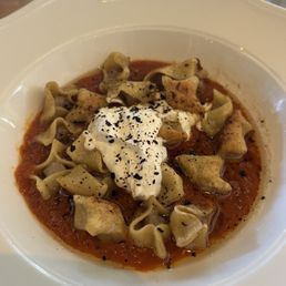 Kayseri Manti - Butter-roasted lamb dumplings, garlic yogurt, Urfa-tomato sauce Kayseri Manti - Butter-roasted lamb dumplings, garlic yogurt, Urfa-tomato sauce
