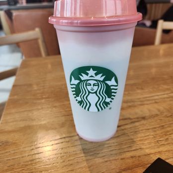 Starbucks - a starbucks cup on a table - Coffee & Tea Near Me - Memphis, Tennessee Starbucks - a starbucks cup on a table - Coffee & Tea Near Me - Memphis, Tennessee