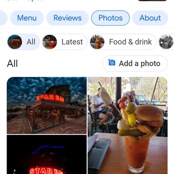 Star Bar - Bloody I came for... - Images show the exterior of Star Bar in Austin, TX, with neon signage, and interior photos featuring food and beverages. - Bars Near Me - Austin, Texas