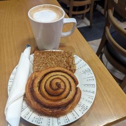 Spires Bakery & Coffee Shop - Delicious Americano coffee, cinnamon swirl and something called a flapjack oats, honey and butter. Yummy
