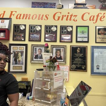 Gritz Cafe - Our sweet waitress and lots of recognition on the wall - Soul Food Near Me - Las Vegas, Nevada