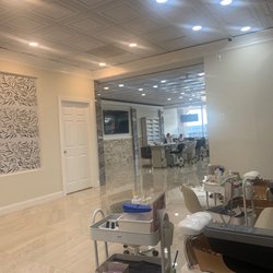 Interior of Salon in pedicure section looking into the manicure section.