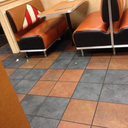 KFC - No one takes care of the store. On a weekday it should not look like this all over the store