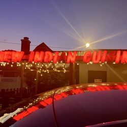 New Indian Cuisine - Exterior at night. Artsy version.