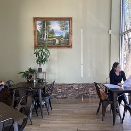 a woman sitting at a table