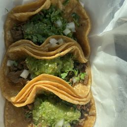 3 carne asada street tacos . Simple & yummy on corn tortillas .