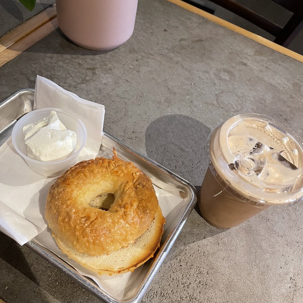 Asiago Bagel with Cream Cheese ($4.00) S'mores Latte with Oat Milk 12oz ($8.50)