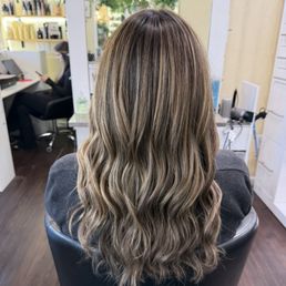 Partial highlight bronde tones on a medium brown natural base