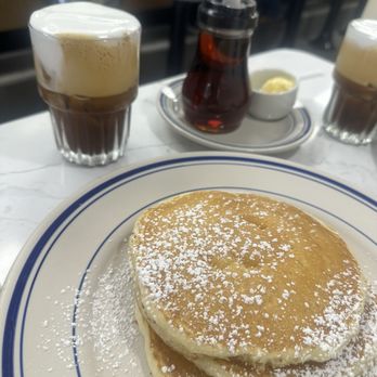 The Greeks - Golden Pancakes with syrup and butter included. Freddo Cappuccino also pictured. - Breakfast & Brunch Near Me - Kearny, New Jersey The Greeks - Golden Pancakes with syrup and butter included. Freddo Cappuccino also pictured. - Breakfast & Brunch Near Me - Kearny, New Jersey