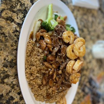 Latin Japan 2 - a plate of rice with shrimp and broccoli - Tacos Near Me - Tampa, Florida Latin Japan 2 - a plate of rice with shrimp and broccoli - Tacos Near Me - Tampa, Florida