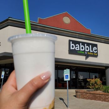 Babble - a hand holding a drink outside a babble - Coffee & Tea Near Me - Oklahoma City, Oklahoma